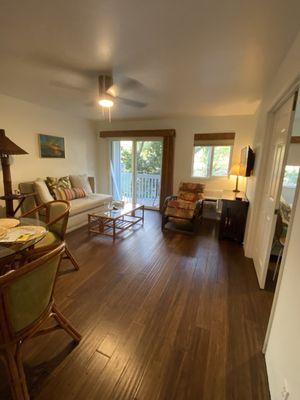 Sofa, coffee table, recliner and mission style console table.