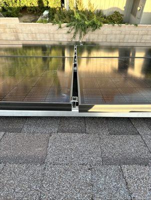 Poor quality of work: misaligned panels, and detached brackets