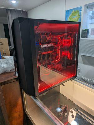 Our custom watercooling demo and office desktop. A triple graphics card, 12 CPU Core custom PC!