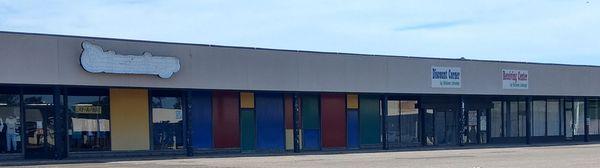 Children's Exchange on the left and the storefront were they take in Consignment clothes to the right.