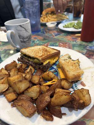 Patty melt + Ortega chile and Pops potatoes