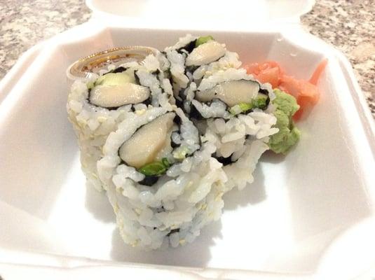 Hamachi roll with scallion, inside out with sesame seeds