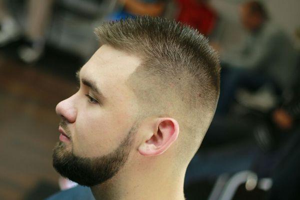 Bald fade shear cut with razor sharp beard