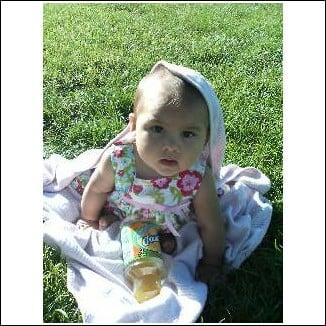 Oh i am a happy baby with Dr Mary taking good care of me!!