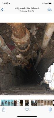 Pipes from the building. Seems rusty