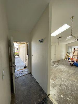 Space to be remodeled with new flooring and baseboard.