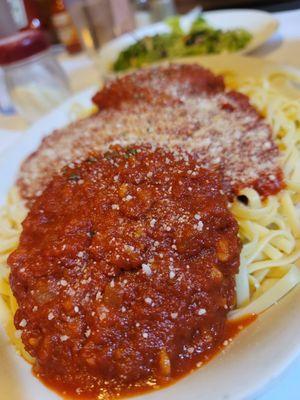 Crabcakes over pasta
