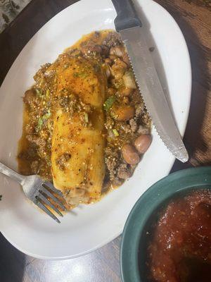 Tamale with salsa verde.