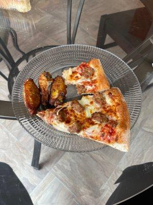 Lemon pepper wings and regular pizza with Italian sausage & onion - Very good and the wings were crispy