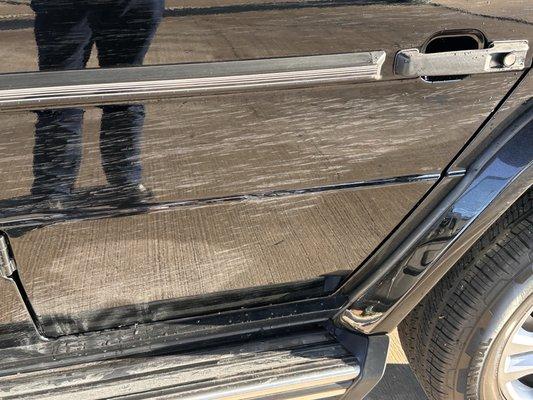 Driver side of the rear door after going through the wash