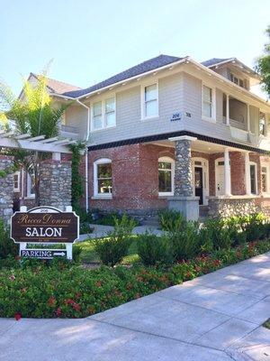 The building is located on the corner of Olive St & Almond Ave.