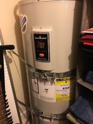 The water heater is in the walk-in closet.