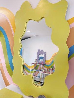 We carry handmade organic shape mirrors!