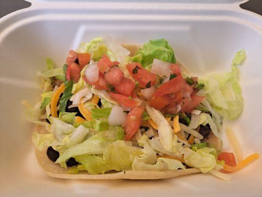 $1.50 bean taco with lettuce, cheese, Pico