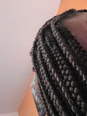Poor braiding technique, hair sticking out of braids