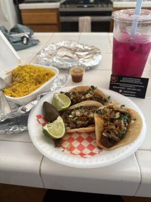 Tacos, rice and beans side, dragon fruit refresher.