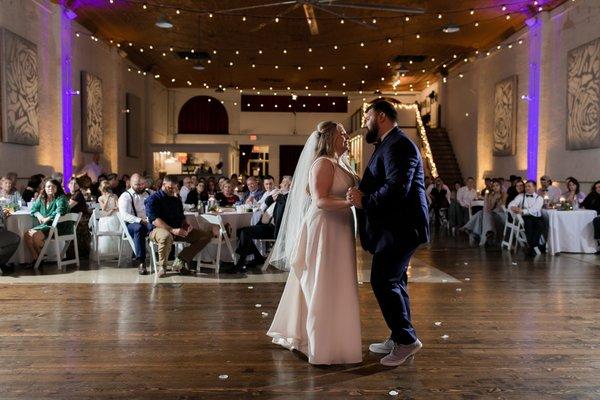 Newlyweds enjoying their first dance as a married couple!