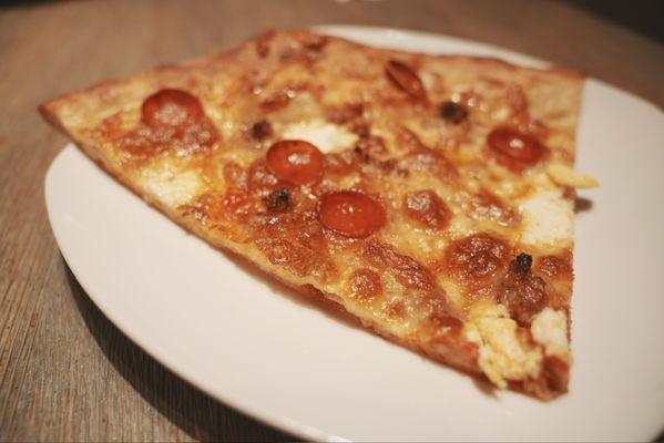 Pepperoni + Burrata + Honey. The pizza crust is amazingly chewy inside.