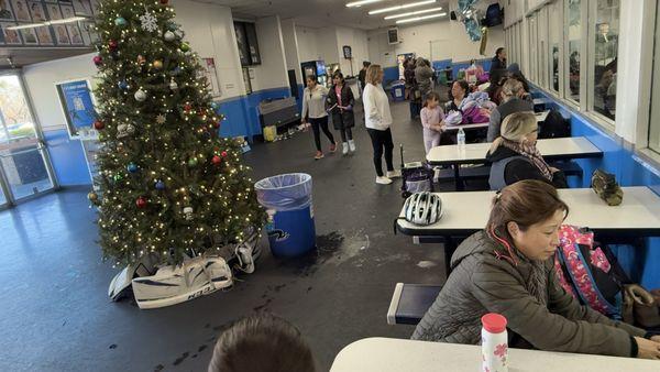 A woman threw up about 1hour ago and no one has cleaned it. They placed a garbage can on top and called it a day.