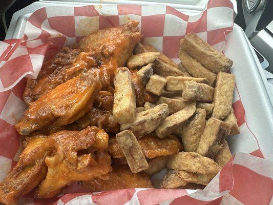10 wings with Buffalo sauce and fresh cut fries