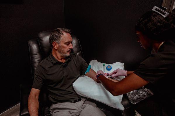 Dr. G getting advanced bloodwork analysis to gain in-depth insights into health markers, optimize wellness, and create a personalized plan