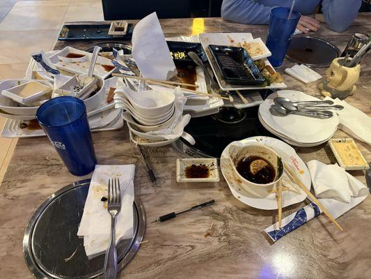 Server wasn't feeling like clearing the table at all, with a table of 6.