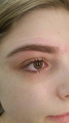 Eyebrow shaping for a clean and defined look.