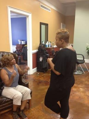 Aliyah the massage therapist listening to client