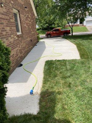 New driveway with an extended walkway.