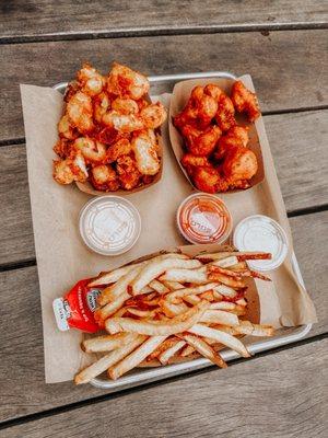 Cheese, curds, cauliflower, wings, and french fries
