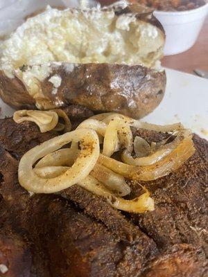 Pork steak and the "infamous" baked potato.