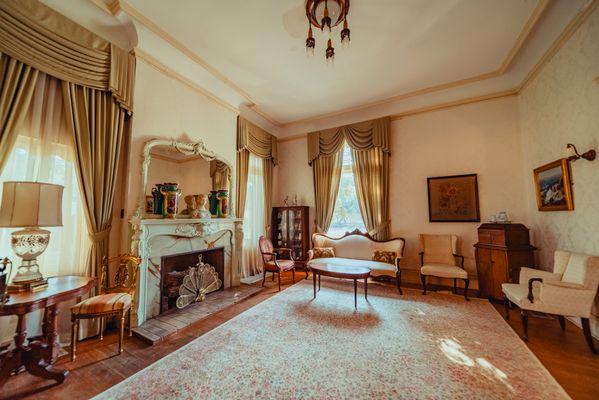 The French Room is a delightful place to host guests at your special event. The marble fireplace is an elegant backdrop for any occasion.