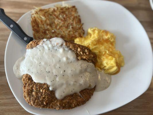 Chicken fried steak, hash browns and cheese eggs