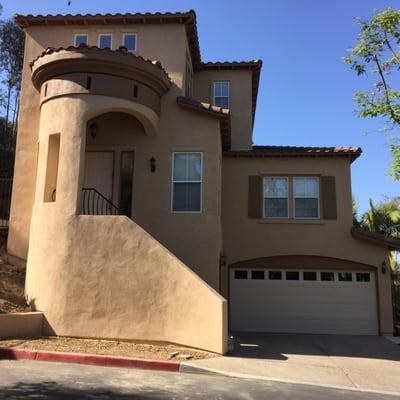 This picture is after painting. We just love the vibrant two-tone look and the shadowing of the garage.