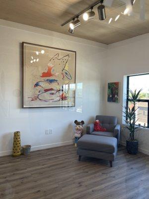 Private office with Kaws plush