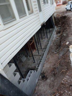 New block foundation being installed.