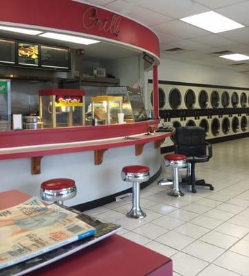 Picture of the grill counter and the washing facility.