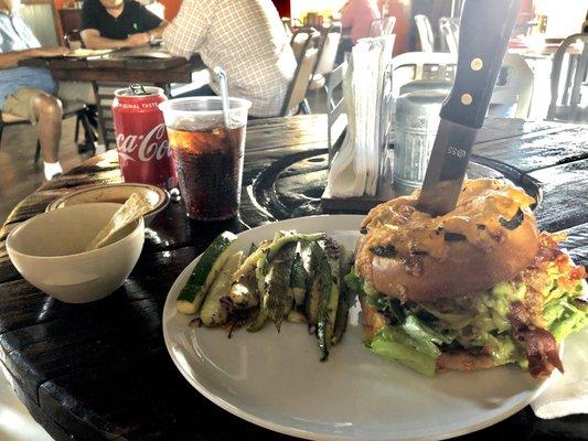 Hulk burger Hulk Brioche Bun, bacon, guacamole, green chilies, onions and lettuce. Zucchini fries