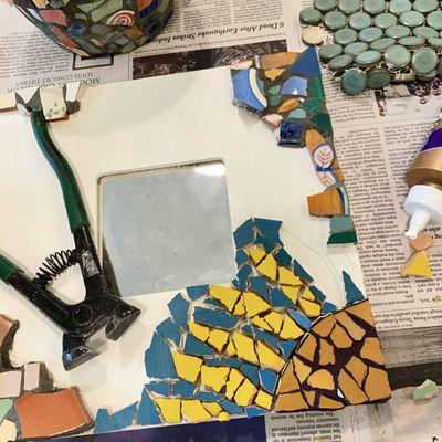 Cut tiles in our fun hands-on Mosaic class.