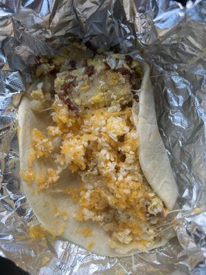 Egg potato bacon cheese taco