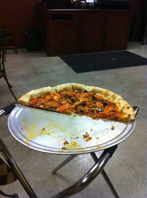 Delicious!! Soft, thin crust with spicy sausage, mushroom and olives!