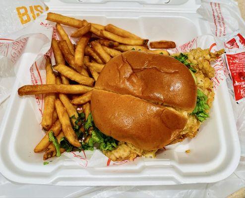 Crispy chicken sandwich with french fries
