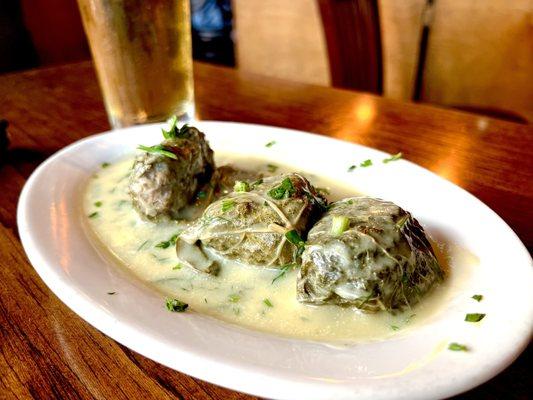 Dolmades (grape leaves with ground beef)