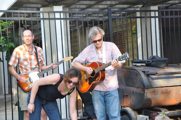 Musicians playing at the farmer's market.