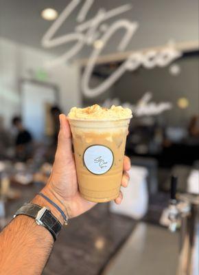 Pumpkin spice latte with pumpkin cold foam