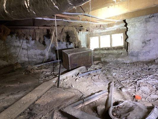 Wired, debris, etc. use caution in this crawlspace