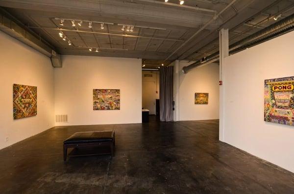 Main Gallery Room featuring Ian Young's "Game On" exhibition.