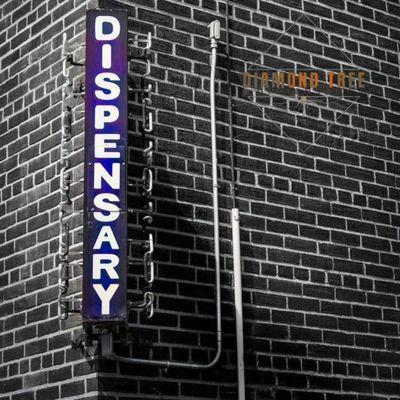 Diamond Tree Dispensary Sign on the side of the building