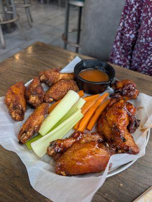 A couple types of wings, desert rub and bourbon glaze, both delicious