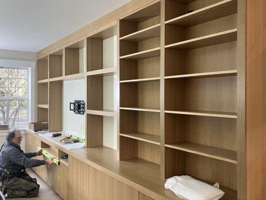 Rift white oak entertainment center wall